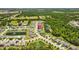 An aerial view shows this home's location within a community with ponds and green spaces at 2721 Greenleaf Ter, Parrish, FL 34219