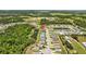 This aerial view shows how this community is set among ponds, green spaces and wooded areas at 2721 Greenleaf Ter, Parrish, FL 34219