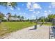 Fully fenced dog park featuring a gravel area and a bench at 2721 Greenleaf Ter, Parrish, FL 34219
