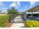 Community dog park with gated entry, picnic tables, and shaded areas for residents at 2721 Greenleaf Ter, Parrish, FL 34219