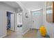 Inviting entryway featuring tile flooring and access to the bedroom and bathroom at 2721 Greenleaf Ter, Parrish, FL 34219
