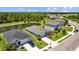 Beautifully landscaped homes with well-manicured lawns and a scenic pond in a desirable neighborhood at 2721 Greenleaf Ter, Parrish, FL 34219