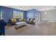 Open-concept living room and breakfast nook has lots of seating and plenty of space at 2721 Greenleaf Ter, Parrish, FL 34219
