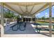 Covered picnic area with multiple tables and seating, mailboxes and easy access to recreational areas at 2721 Greenleaf Ter, Parrish, FL 34219