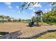 Community playground featuring slides, climbing structures, and a swing set at 2721 Greenleaf Ter, Parrish, FL 34219