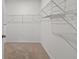 This walk-in closet features carpeted floors and wire shelving at 2721 Greenleaf Ter, Parrish, FL 34219