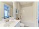 Bright bathroom with tub, shower, and modern vanity with double sinks, perfect for relaxation and convenience at 3027 Formia Ct, Lakewood Ranch, FL 34211