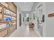 Bright salon with tile floors, ample retail shelving, and comfortable seating area at 3027 Formia Ct, Lakewood Ranch, FL 34211