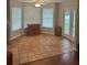 Bright breakfast nook with tile floors, large windows, and a ceiling fan at 3287 Rackley Rd, Brooksville, FL 34604