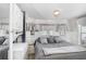Bedroom with a comfortable bed, and a stacked washer/dryer at 3333 26Th E Ave # 1104, Bradenton, FL 34208