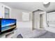Comfortable bedroom with a television and plenty of natural light at 3333 26Th E Ave # 1104, Bradenton, FL 34208