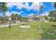 Community clubhouse, picnic area with covered pavilions surrounded by green lawns at 3333 26Th E Ave # 1104, Bradenton, FL 34208