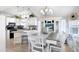 Bright open concept kitchen and dining area featuring modern decor and lots of natural light at 3333 26Th E Ave # 1104, Bradenton, FL 34208