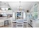 Bright open concept kitchen and dining area featuring modern decor and lots of natural light at 3333 26Th E Ave # 1104, Bradenton, FL 34208