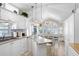 Bright kitchen and dining area with white cabinets, modern appliances, and lots of natural light at 3333 26Th E Ave # 1104, Bradenton, FL 34208