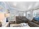 Charming living room with natural light, comfortable seating, and stylish decor at 3333 26Th E Ave # 1104, Bradenton, FL 34208
