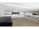 Loft area with carpet flooring, natural lighting, and a comfortable seating area at 3333 26Th E Ave # 1104, Bradenton, FL 34208