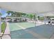 Outdoor community shuffleboard courts with shaded pavilion and adjacent picnic tables at 3333 26Th E Ave # 1104, Bradenton, FL 34208
