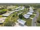 This aerial shot highlights the lush greenery, mature trees, and meticulously maintained lawns throughout the community at 3649 Somerville Dr # 1507, Sarasota, FL 34232