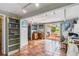 Bonus room with terracotta tile, recessed lighting and access to an outdoor patio at 3649 Somerville Dr # 1507, Sarasota, FL 34232