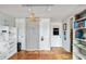 Additional bonus room with terracotta tile, shelving, and exterior door at 3649 Somerville Dr # 1507, Sarasota, FL 34232