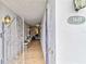 Inviting walkway leading to the front door with decorative gate at 3649 Somerville Dr # 1507, Sarasota, FL 34232