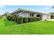 Charming single-story home with well-kept lawn and mature hedges at 3649 Somerville Dr # 1507, Sarasota, FL 34232