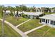 Charming single-story homes featuring well-maintained lawns and sidewalks, perfect for a serene living environment at 3649 Somerville Dr # 1507, Sarasota, FL 34232
