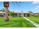 Charming single-story home with well-manicured lawn and lush landscaping at 3649 Somerville Dr # 1507, Sarasota, FL 34232