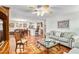 Open-concept living space with tile floors connecting to dining and kitchen areas at 3649 Somerville Dr # 1507, Sarasota, FL 34232