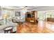 Spacious living room with tile floors, ceiling fan, and comfortable seating at 3649 Somerville Dr # 1507, Sarasota, FL 34232