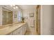 Well-lit bathroom featuring a glass door shower and granite countertops at 3764 Oak Grove Dr, Sarasota, FL 34243