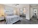 Comfortable bedroom with neutral tones, mirrored closet doors, and natural light at 4151 Olive Ave, Sarasota, FL 34231