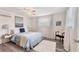 Serene bedroom featuring soft hues, a large window, and calming decor for a peaceful retreat at 4151 Olive Ave, Sarasota, FL 34231