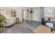 Bright living room boasting modern gray floors, stylish furnishings, and an open, airy layout at 4151 Olive Ave, Sarasota, FL 34231