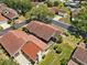 Aerial view of single-story home showcasing mature landscaping and neighborhood streets at 4203 Carriage Dr # 27, Sarasota, FL 34241