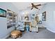 Bright living area featuring an ottoman, natural light, and casual seating at 4203 Carriage Dr # 27, Sarasota, FL 34241