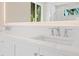 Elegant bathroom vanity with double sinks, quartz countertop, and stylish fixtures at 430 Pheasant Way, Sarasota, FL 34236