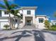 Stately two-story home with manicured landscaping, stone accents, and inviting entrance at 430 Pheasant Way, Sarasota, FL 34236