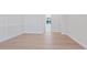 Bright, airy living room with wood flooring and stylish trim at 430 Pheasant Way, Sarasota, FL 34236