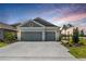 Charming single-Gathering home with a two-car garage and well-maintained landscaping at 4406 Rustling Pines Ter, Parrish, FL 34219