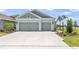 Charming single-Gathering home with a two-car garage and well-maintained landscaping at 4406 Rustling Pines Ter, Parrish, FL 34219
