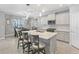 Open concept kitchen with a center island, pendant lights, and stainless steel appliances at 4406 Rustling Pines Ter, Parrish, FL 34219
