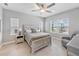 Serene main bedroom with neutral tones and pool views at 4406 Rustling Pines Ter, Parrish, FL 34219