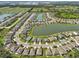 Beautiful homes surrounding a pond, showcasing a peaceful and well-planned community with green spaces at 4503 Lindever Ln, Palmetto, FL 34221