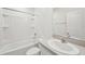 Bathroom featuring a combination shower and tub, vanity and a large mirror at 4503 Lindever Ln, Palmetto, FL 34221