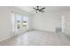 Bright, spacious bedroom with tiled floors, and natural light from large windows at 4503 Lindever Ln, Palmetto, FL 34221