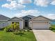 Charming single-Gathering home with a well-manicured lawn and a two-car garage at 4503 Lindever Ln, Palmetto, FL 34221