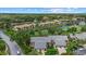 Stunning aerial view of a meticulously maintained community with lush landscaping and golf course at 4505 Kingsmere # 2, Sarasota, FL 34235