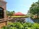 Relax in the gazebo overlooking water feature, offering a peaceful retreat within the community at 4505 Kingsmere # 2, Sarasota, FL 34235